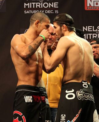 LAS VEGAS, NV - DECEMBER 14: (L-R) Vinc Pichel and Rustam Khabilov face off during TUF 16 Finale weigh in on December 14, 2012 at the Joint at the Hard Rock in Las Vegas, Nevada. (Photo by Jim Kemper/Zuffa LLC/Zuffa LLC via Getty Images)