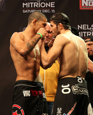 LAS VEGAS, NV - DECEMBER 14:  (L-R) Vinc Pichel and Rustam Khabilov face off during TUF 16 Finale weigh in on December 14, 2012  at the Joint at the Hard Rock in Las Vegas, Nevada.  (Photo by Jim Kemper/Zuffa LLC/Zuffa LLC via Getty Images)