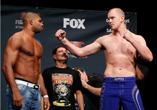 PHOENIX, AZ - DECEMBER 12: (L-R) Opponents Alistair Overeem of the Netherlands and Stefan Struve of the Netherlands face off during the UFC Fight Night weigh-in event at the Phoenix Convention Center on December 12, 2014 in Phoenix, Arizona. (Photo by Jos