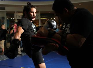 SUNRISE, FL - JUNE 06: Ian McCall works out for fans and media during the UFC open workouts at Sawgrass Mills Mall on June 6, 2012 in Sunrise, Florida. (Photo by Josh Hedges/Zuffa LLC/Zuffa LLC via Getty Images)