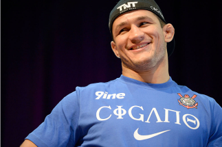 HOUSTON, TX - OCTOBER 16: Junior Dos Santos reacts to the crowd at an open training session for fans and media inside House of Blues on October 16, 2013 in Houston, Texas. (Photo by Jeff Bottari/Zuffa LLC/Zuffa LLC via Getty Images) *** Local Caption ***