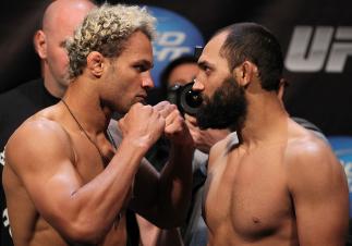 EAST RUTHERFORD, NJ - MAY 04: (L-R) Welterweight opponents Josh Koscheck and Johny Hendricks face off after weighing in during the UFC on FOX official weigh in at Izod Center on May 4, 2012 in East Rutherford, New Jersey. (Photo by Josh Hedges/Zuffa LLC