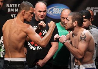 EAST RUTHERFORD, NJ - MAY 04: (L-R) Main event opponents Nate Diaz and Jim Miller face off aftering weighing in during the UFC on FOX official weigh in at Izod Center on May 4, 2012 in East Rutherford, New Jersey. (Photo by Josh Hedges/Zuffa LLC/Zuffa L