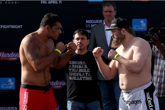 ABU DHABI, UNITED ARAB EMIRATES - APRIL 10: Antonio Rodrigo Nogueira and Roy Nelson face-off after they weigh-in for UFC Fight Night 39 on April 10, 2014 in Abu Dhabi, United Arab Emirates. UFC Fight Night 39 will take place on April 11 at du Arena featu