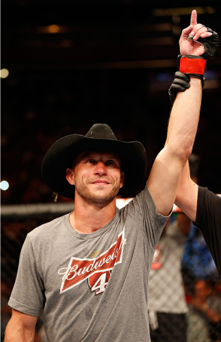 ORLANDO, FL - APRIL 19: Donald "Cowboy" Cerrone reacts after his submission victory over Edson Barboza in their lightweight bout during the FOX UFC Saturday event at the Amway Center on April 19, 2014 in Orlando, Florida. (Photo by Josh Hedges/Zuffa LLC/