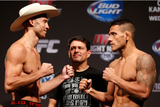 INDIANAPOLIS, IN - AUGUST 27: (L-R) Opponents Donald "Cowboy" Cerrone and Rafael dos Anjos face off during the UFC weigh-in event at Bankers Life Fieldhouse on August 27, 2013 in Indianapolis, Indiana. (Photo by Josh Hedges/Zuffa LLC/Zuffa LLC via Getty