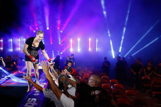 SAN DIEGO, CA - AUGUST 18: Ronda Rousey reacts after defeating Sarah Kaufman by submission during the Strikeforce event at Valley View Casino Center on August 18, 2012 in San Diego, California. (Photo by Esther Lin/Forza LLC/Forza LLC via Getty Images)