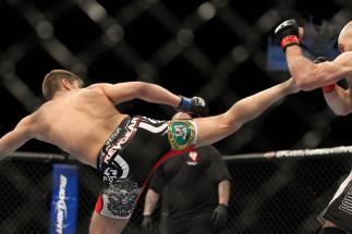 LAS VEGAS, NV - FEBRUARY 04: Stephen Thompson (left) kicks Dan Stittgen during the UFC 143 event at Mandalay Bay Events Center on February 4, 2012 in Las Vegas, Nevada. (Photo by Josh Hedges/Zuffa LLC/Zuffa LLC via Getty Images) *** Local Caption *** St