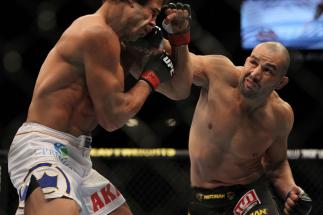 LAS VEGAS, NV - MAY 26: Glover Teixeira (right) punches Kyle Kingsbury during a light heavyweight bout at UFC 146 at MGM Grand Garden Arena on May 26, 2012 in Las Vegas, Nevada. (Photo by Josh Hedges/Zuffa LLC/Zuffa LLC via Getty Images)