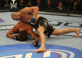 LAS VEGAS, NV - MAY 26: Glover Teixeira (top) punches Kyle Kingsbury during a light heavyweight bout at UFC 146 at MGM Grand Garden Arena on May 26, 2012 in Las Vegas, Nevada. (Photo by Donald Miralle/Zuffa LLC/Zuffa LLC via Getty Images)