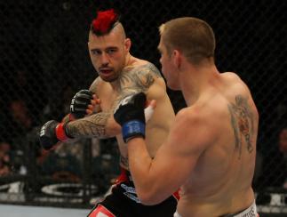 LAS VEGAS, NV - MAY 26: Dan Hardy (L) throws a punch at Duane Ludwig during a welterweight bout at UFC 146 at MGM Grand Garden Arena on May 26, 2012 in Las Vegas, Nevada. (Photo by Donald Miralle/Zuffa LLC/Zuffa LLC via Getty Images)
