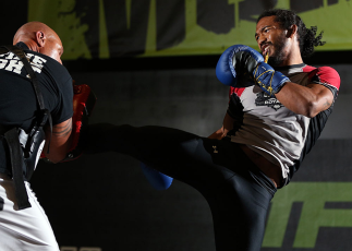 DENVER, CO - AUGUST 08: Benson Henderson works out for the media during the UFC 150 open workouts at the Muscle Pharm Sports Science Center on August 8, 2012 in Denver, Colorado. (Photo by Josh Hedges/Zuffa LLC/Zuffa LLC via Getty Images)
