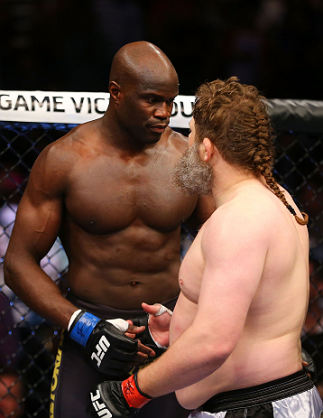 NEWARK, NJ - APRIL 27: (L-R) Cheick Kongo of France and Roy Nelson shakes hands after Nelson won by knockout in their heavyweight bout during the UFC 159 event at the Prudential Center on April 27, 2013 in Newark, New Jersey. (Photo by Al Bello/Zuffa LLC