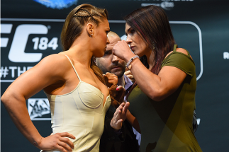 LOS ANGELES, CA - FEBRUARY 25: (L-R) Opponents Ronda Rousey and Cat Zingano face off during the UFC 184 Ultimate Media Day at Club Nokia on February 25, 2015 in Los Angeles, California. (Photo by Josh Hedges/Zuffa LLC/Zuffa LLC via Getty Images)