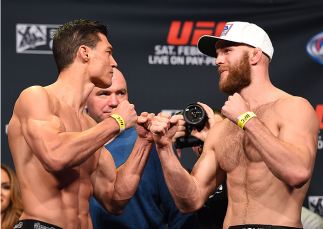 LOS ANGELES, CA - FEBRUARY 27:  (L-R) Opponents Alan Jouban and Richard Walsh of Australia face off during the UFC 184 weigh-in at the Event Deck and LA Live on February 27, 2015 in Los Angeles, California. (Photo by Josh Hedges/Zuffa LLC/Zuffa LLC via Ge