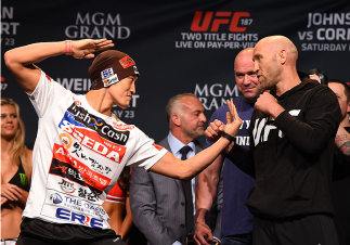 LAS VEGAS, NV - MAY 22:   (L-R) Opponents Dong Hyun Kim of South Korea and Josh Burkman face off during the UFC 187 weigh-in at the MGM Grand Conference Center on May 22, 2015 in Las Vegas, Nevada. (Photo by Josh Hedges/Zuffa LLC/Zuffa LLC via Getty Image