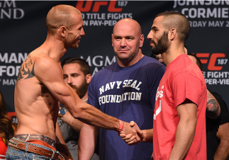 LAS VEGAS, NV - MAY 22:   (L-R) Opponents Donald 'Cowboy' Cerrone and John Makdessi of Canada face off during the UFC 187 weigh-in at the MGM Grand Conference Center on May 2, 2015 in Las Vegas, Nevada. (Photo by Josh Hedges/Zuffa LLC/Zuffa LLC via Getty 