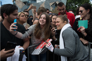MELBOURNE, AUSTRALIA - NOVEMBER 12: UFC women's bantamweight champion Ronda Rousey of the United States takes pictures with fans at Federation Square on November 12, 2015 in Melbourne, Australia. (Photo by Brandon Magnus/Zuffa LLC/Zuffa LLC via Getty Ima