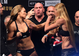 MELBOURNE, AUSTRALIA - NOVEMBER 14: (L-R) Opponents Ronda Rousey of the United States and Holly Holm of the United States face off during the UFC 193 weigh-in at Etihad Stadium on November 14, 2015 in Melbourne, Australia. (Photo by \{snum}\/Zuffa LLC/Zuf