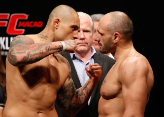 MACAU, MACAU - NOVEMBER 09:  (L-R) Opponents Thiago Silva and Stanislav Nedkov face off during the UFC Macau weigh in at Cotai Arena on November 9, 2012 in Macau, Macau.  (Photo by Josh Hedges/Zuffa LLC/Zuffa LLC via Getty Images)