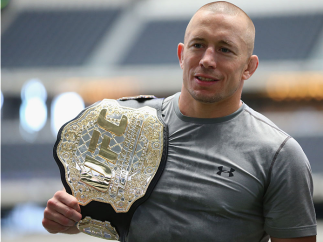 ARLINGTON, TX - AUGUST 02: UFC fighter Georges St-Pierre during a UFC World Tour open workout ahead of a UFC Welterweight Title fight at the AT&T Stadium on August 2, 2013 in Arlington, Texas. Georges St-Pierre and Johny Hendricks will fight on November