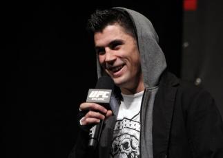CHICAGO, IL - JANUARY 27: UFC Bantamweight Champion Dominick Cruz interacts with fans during a Q&A session before the UFC on FOX official weigh in at the Chicago Theatre on January 27, 2012 in Chicago, Illinois. (Photo by Josh Hedges/Zuffa LLC/Zuffa LLC
