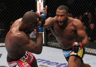 CHICAGO, IL - JANUARY 28: (R-L) Rashad Evans punches Phil Davis during the UFC on FOX event at United Center on January 28, 2012 in Chicago, Illinois. (Photo by Nick Laham/Zuffa LLC/Zuffa LLC via Getty Images) *** Local Caption *** Rashad Evans; Phil Da