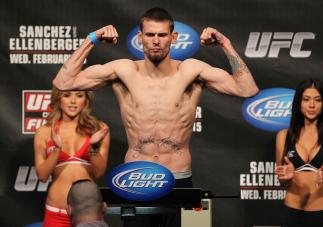 OMAHA, NE - FEBRUARY 14: Tim Means weighs in during the UFC on FUEL TV weigh in event at Omaha Civic Auditorium on February 14, 2012 in Omaha, Nebraska. (Photo by Josh Hedges/Zuffa LLC/Zuffa LLC via Getty Images) *** Local Caption *** Tim Means
