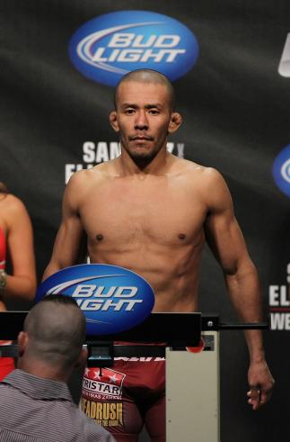 OMAHA, NE - FEBRUARY 14: Ivan Menjivar weighs in during the UFC on FUEL TV weigh in event at Omaha Civic Auditorium on February 14, 2012 in Omaha, Nebraska. (Photo by Josh Hedges/Zuffa LLC/Zuffa LLC via Getty Images) *** Local Caption *** Ivan Menjivar