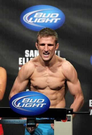 OMAHA, NE - FEBRUARY 14: TJ Dillashaw weighs in during the UFC on FUEL TV weigh in event at Omaha Civic Auditorium on February 14, 2012 in Omaha, Nebraska. (Photo by Josh Hedges/Zuffa LLC/Zuffa LLC via Getty Images) *** Local Caption *** TJ Dillashaw