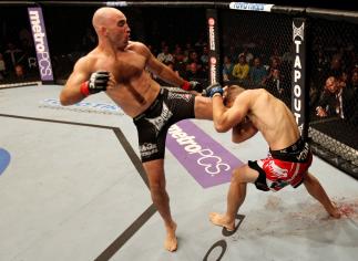 ATLANTIC CITY, NJ - JUNE 22: Brian Ebersole (L) kicks T.J. Waldburger (R) in a welterweight bout during UFC on FX 4 at Revel Casino on June 22, 2012 in Atlantic City, New Jersey. (Photo by Nick Laham/Zuffa LLC/Zuffa LLC)