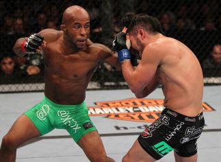 SUNRISE, FL - JUNE 08: (L-R) Demetrious Johnson punches Ian McCall in a Flyweight bout during the UFC on FX 3 event at Bank Atlantic Center on June 8, 2012 in Sunrise, Florida. (Photo by Josh Hedges/Zuffa LLC/Zuffa LLC via Getty Images)