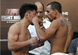 SINGAPORE - JANUARY 03: (L and R)  Tatsuya Kawajiri and Sean Soriano face off during the UFC Fight Night Singapore Weigh-in at the Shoppes at Marina Bay Sands on January 3, 2014 in Singapore. (Photo by Mitch Viquez/Zuffa LLC/Zuffa LLC via Getty Images)