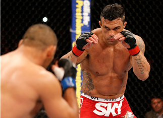 GOIANIA, BRAZIL - NOVEMBER 09: (R-L) Vitor Belfort squares off with Dan Henderson in their light heavyweight bout during the UFC event at Arena Goiania on November 9, 2013 in Goiania, Brazil. (Photo by Josh Hedges/Zuffa LLC/Zuffa LLC via Getty Images)