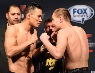 BROOMFIELD, CO - FEBRUARY 13: (L-R) Opponents James Moontasri and Cody Pfister face off during the UFC weigh-in at the 1stBank Center on February 13, 2015 in Broomfield, Colorado. (Photo by Josh Hedges/Zuffa LLC/Zuffa LLC via Getty Images)