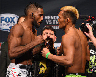 BROOMFIELD, CO - FEBRUARY 13: (L-R) Opponents Neil Magny and Kiichi Kunimoto of Japan face off during the UFC weigh-in at the 1stBank Center on February 13, 2015 in Broomfield, Colorado. (Photo by Josh Hedges/Zuffa LLC/Zuffa LLC via Getty Images)