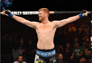 ADELAIDE, AUSTRALIA - MAY 10: Sam Alvey celebrates his knock out victory over Daniel Kelly in their middleweight bout during the UFC Fight Night event at the Adelaide Entertainment Centre on May 10, 2015 in Adelaide, Australia. (Photo by Josh Hedges/Zuf