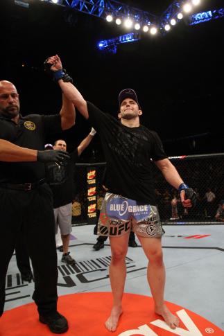 EAST RUTHERFORD, NJ - MAY 05: Alan Belcher celebrates after defeating Rousimar Palhares in thier Middleweight bout at Izod Center on May 5, 2012 in East Rutherford, New Jersey. (Photo by Josh Hedges/Zuffa LLC/Zuffa LLC via Getty Images)
