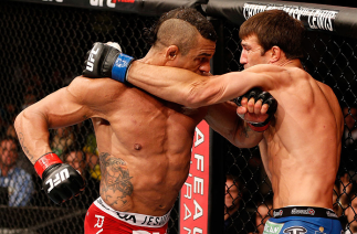 JARAGUA DO SUL, BRAZIL - MAY 18: (L-R) Vitor Belfort punches Luke Rockhold in their middleweight bout during the UFC on FX event on May 18, 2013 at Arena Jaragua in Jaragua do Sul, Santa Catarina, Brazil. (Photo by Josh Hedges/Zuffa LLC/Zuffa LLC via G