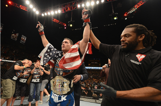 LAS VEGAS, NV - JULY 05: UFC middleweight champion Chris Weidman retains his championship belt after defeating Lyoto Machida in their UFC middleweight championship fight at UFC 175 inside the Mandalay Bay Events Center on July 5, 2014 in Las Vegas, Nevad