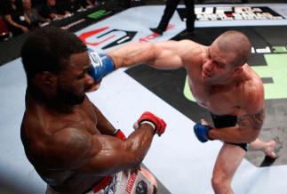 PORTLAND, OR - JULY 14: (R-L) Nate Marquardt punches Tyron Woodley during their welterweight bout at the Strikeforce event at the Rose Garden on July 14, 2012 in Portland, Oregon. (Photo by Esther Lin/Forza LLC/Zuffa LLC via Getty Images) *** Local Ca