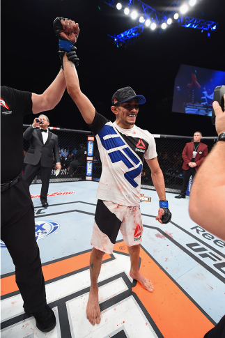 LAS VEGAS, NV - DECEMBER 11: Tony Ferguson reacts to his victory over Edson Barboza in their lightweight bout during the TUF Finale event inside The Chelsea at The Cosmopolitan of Las Vegas on December 11, 2015 in Las Vegas, Nevada. (Photo by Jeff Bottar