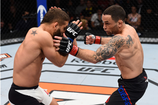 LAS VEGAS, NV - DECEMBER 11:  (R-L) Frankie Edgar punches Chad Mendes in their featherweight bout during the TUF Finale event inside The Chelsea at The Cosmopolitan of Las Vegas on December 11, 2015 in Las Vegas, Nevada.  (Photo by Jeff Bottari/Zuffa LLC/