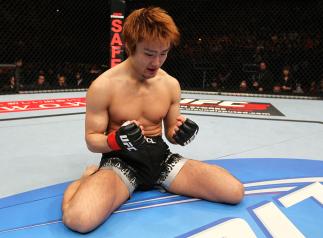 SAITAMA, JAPAN - FEBRUARY 26: Takanori Gomi reacts after defeating Eiji Mitsuoka by TKO during the UFC 144 event at Saitama Super Arena on February 26, 2012 in Saitama, Japan. (Photo by Al Bello/Zuffa LLC/Zuffa LLC via Getty Images) *** Local Caption **