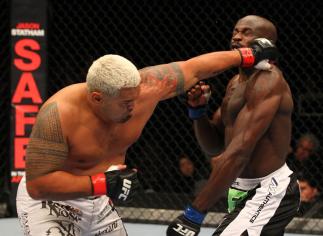 SAITAMA, JAPAN - FEBRUARY 26: (L-R) Mark Hunt punches Cheick Kongo during the UFC 144 event at Saitama Super Arena on February 26, 2012 in Saitama, Japan. (Photo by Al Bello/Zuffa LLC/Zuffa LLC via Getty Images) *** Local Caption *** Mark Hunt; Cheick K