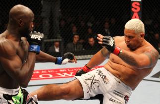 SAITAMA, JAPAN - FEBRUARY 26: (R-L) Mark Hunt kicks Cheick Kongo during the UFC 144 event at Saitama Super Arena on February 26, 2012 in Saitama, Japan. (Photo by Al Bello/Zuffa LLC/Zuffa LLC via Getty Images) *** Local Caption *** Mark Hunt; Cheick Kon