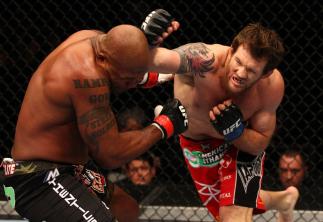 SAITAMA, JAPAN - FEBRUARY 26: (R-L) Ryan Bader punches Quinton "Rampage" Jackson during the UFC 144 event at Saitama Super Arena on February 26, 2012 in Saitama, Japan. (Photo by Al Bello/Zuffa LLC/Zuffa LLC via Getty Images) *** Local Caption *** Quint