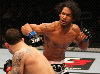 SAITAMA, JAPAN - FEBRUARY 26: (R-L) Benson Henderson punches Frankie Edgar during the UFC 144 event at Saitama Super Arena on February 26, 2012 in Saitama, Japan. (Photo by Al Bello/Zuffa LLC/Zuffa LLC via Getty Images) *** Local Caption *** Frankie Edg