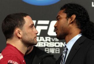 TOKYO, JAPAN - FEBRUARY 23: (L-R) UFC Lightweight Champion Frankie Edgar and challenger Benson Henderson face off at the final UFC 144 pre-fight press conference at the Ritz-Carlton Hotel on February 23, 2012 in Tokyo, Japan. (Photo by Josh Hedges/Zuffa