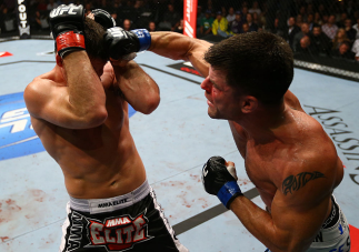 TORONTO, CANADA - SEPTEMBER 22: (R-L) Brian Stann punches Michael Bisping during their middleweight bout at UFC 152 inside Air Canada Centre on September 22, 2012 in Toronto, Ontario, Canada. (Photo by Al Bello/Zuffa LLC/Zuffa LLC via Getty Images)